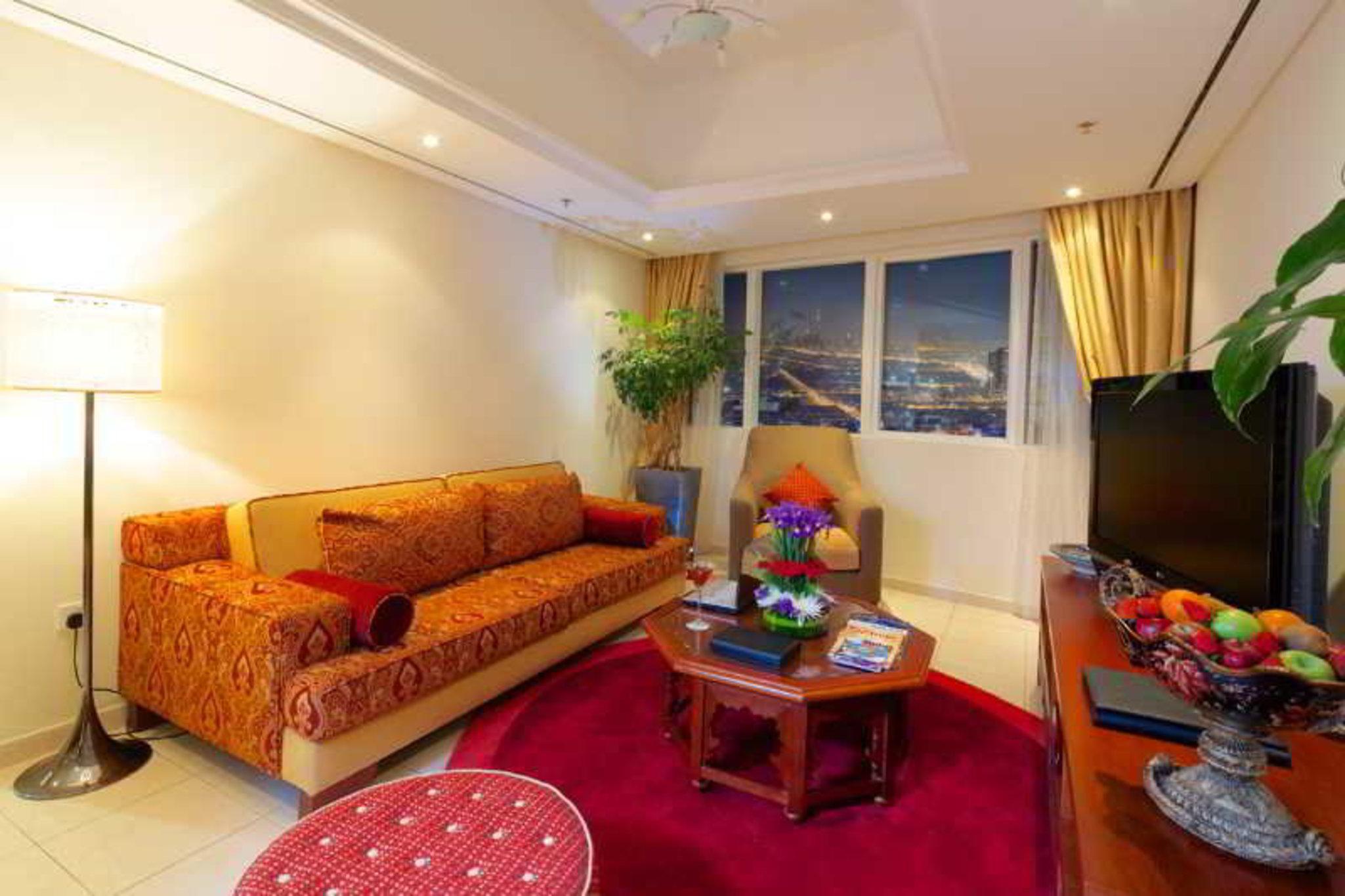 Tamani Marina Hotel & Apartments Дубай Екстер'єр фото A living room in a hotel suite